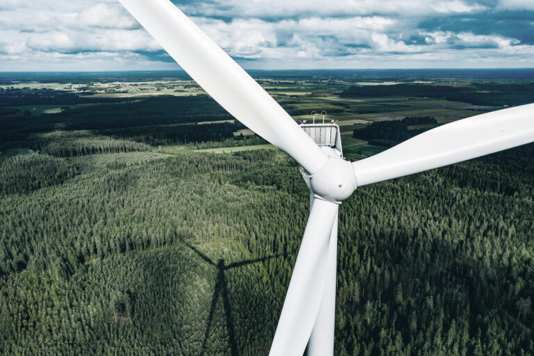 Close up of onshore wind turbine with Ultra High Performance Concrete (UHPC) foundation from Y-MatTec
